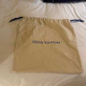 Louis Vuitton Cream Bag with Blue Logo